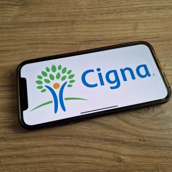 Konskie, Poland - May 20, 2023: Cigna healthcare insurance company logo displayed on mobile phone screen