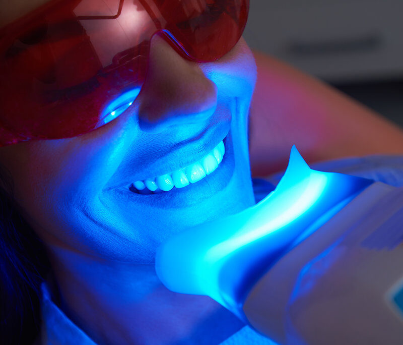 Close up of happy lady doing teeth treatment in dental clinic